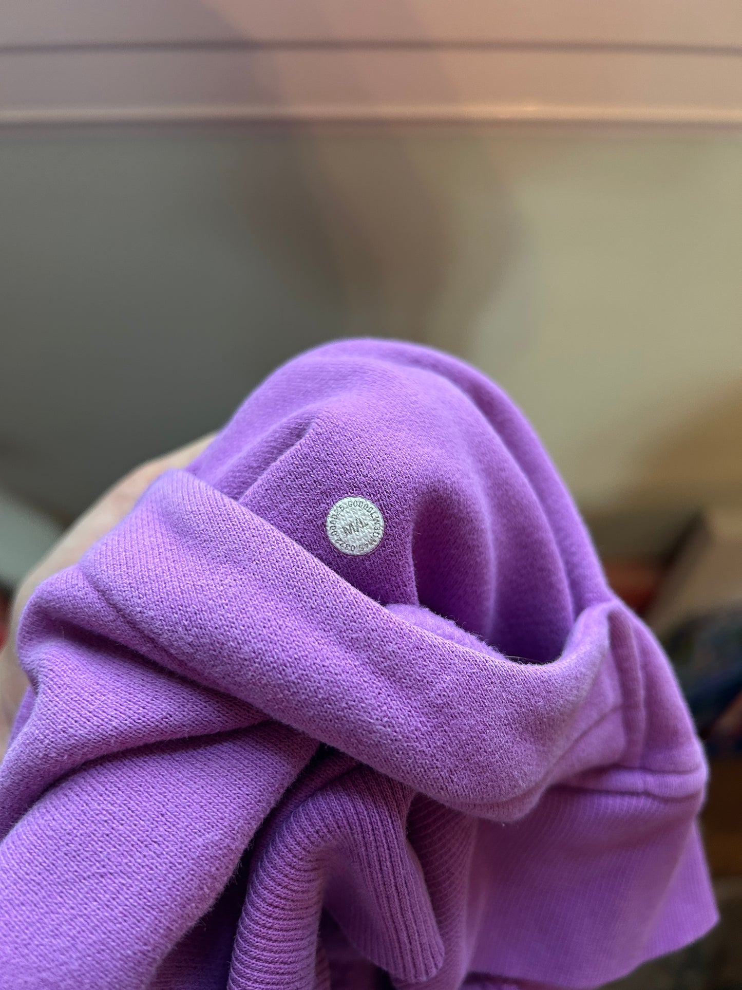 Lululemon M/L purple cropped half-zip scuba hoodie with kangaroo pocket and fleece lining.