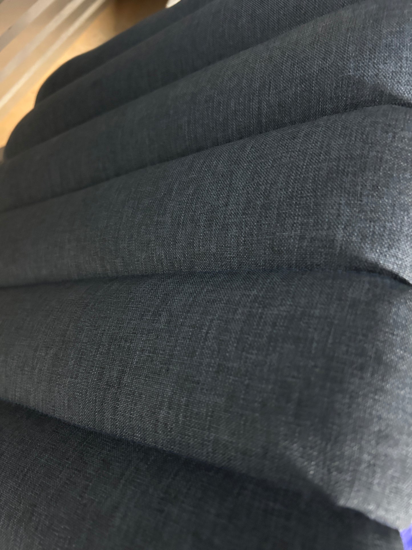 Wayfair blue upholstered channel-tufted twin headboard with vertical pleating and black metal legs.