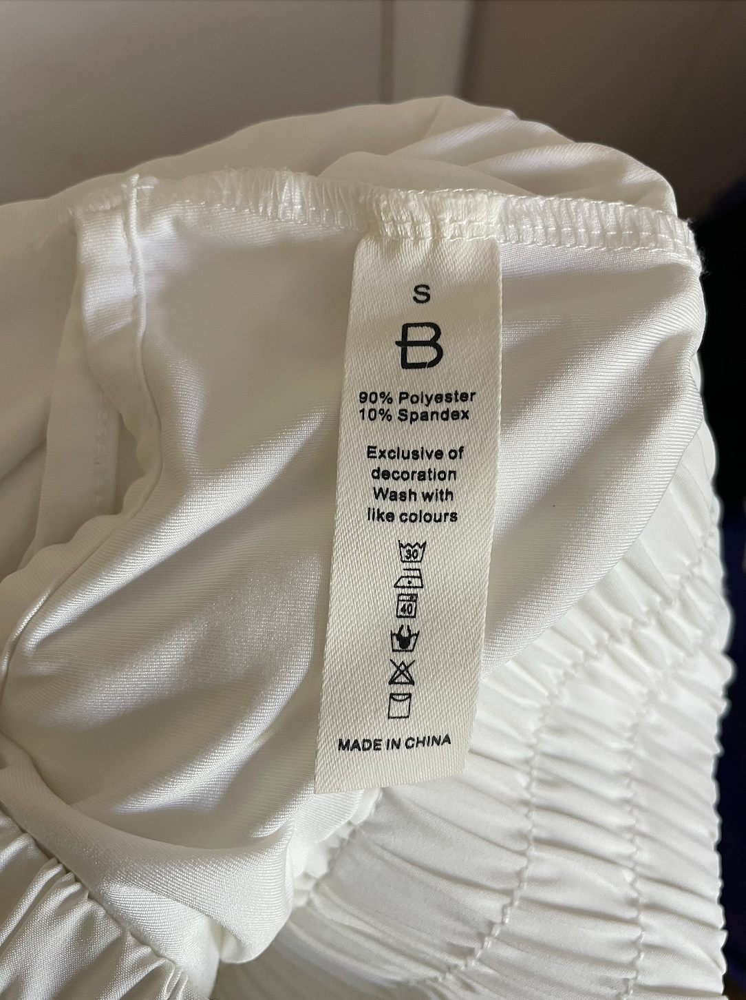 White athletic shorts with side pockets.
