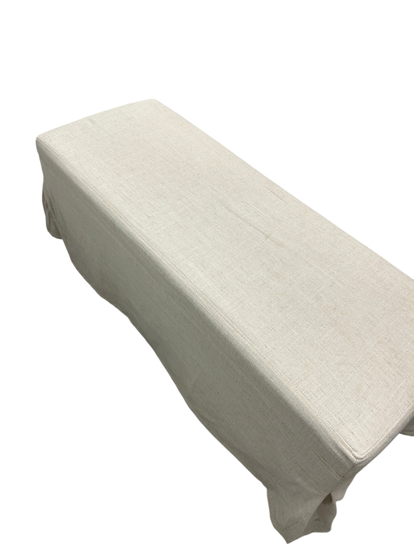 Wayfair beige upholstered ottoman bench with a hinged top and draped fabric skirt.