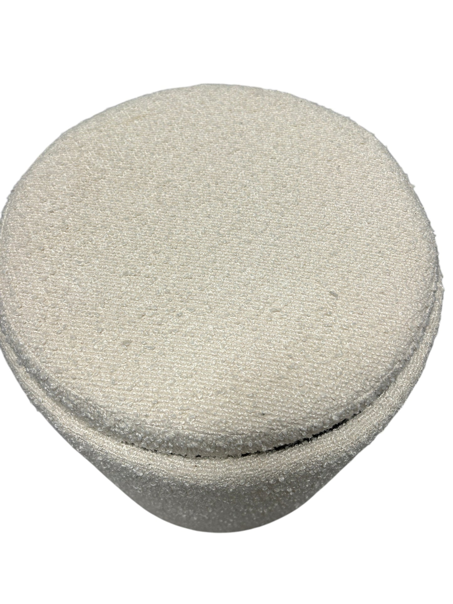 Cream yarn ottoman with storage and wooden tray top.