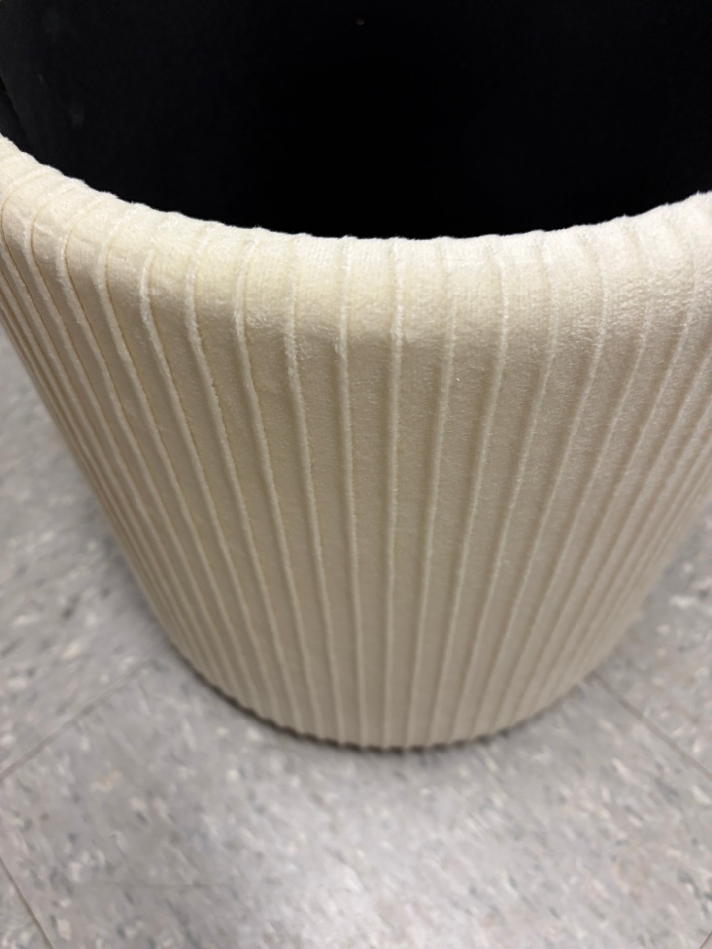 Cream velvet ottoman with storage.
