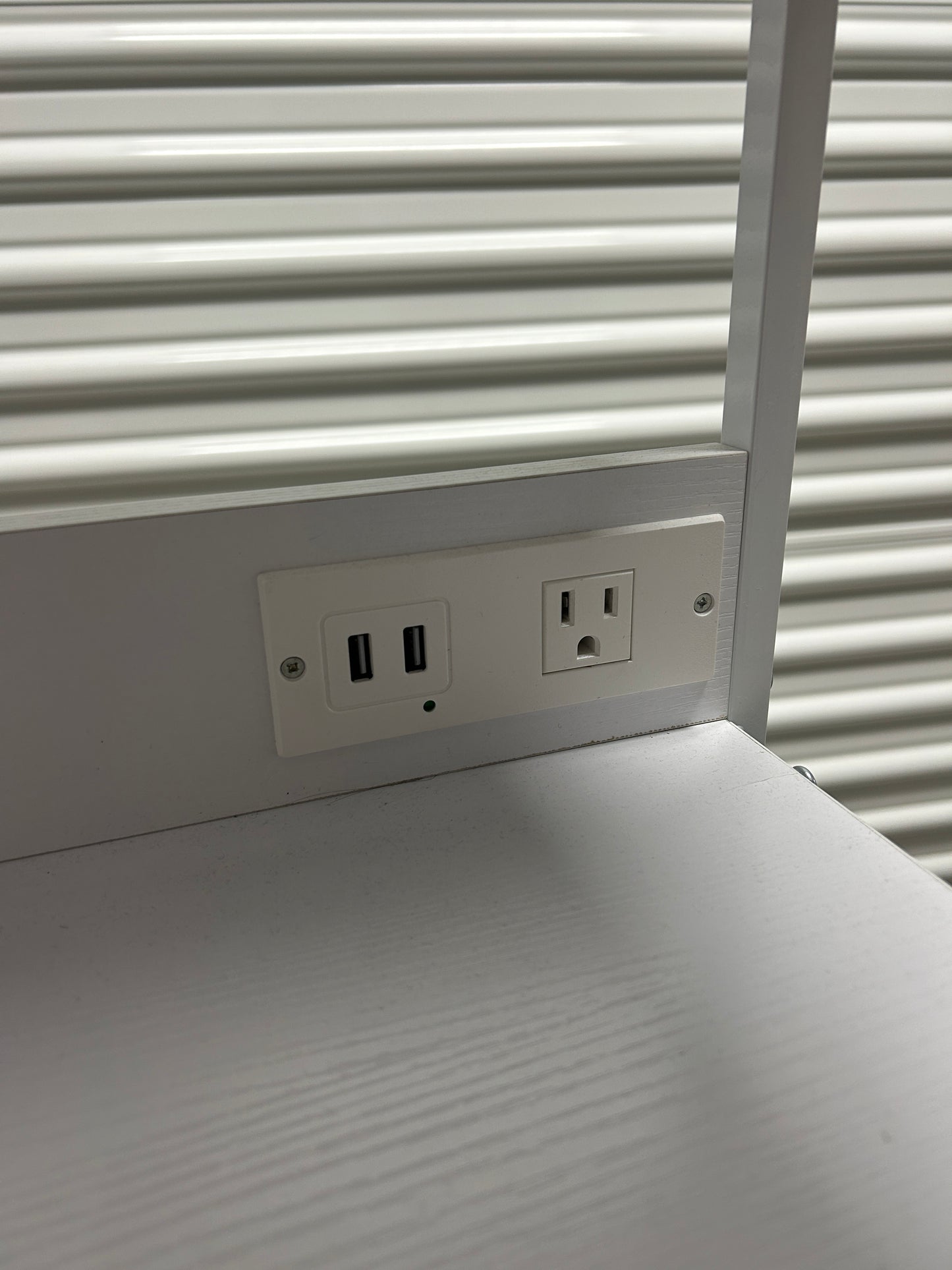 Dormify white nightstand with 3 drawers and power outlets.