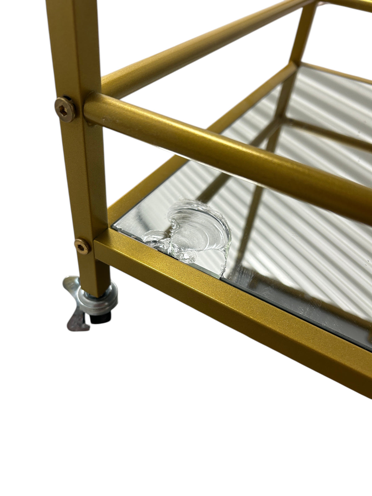 Gold bar cart with 3 glass shelves.