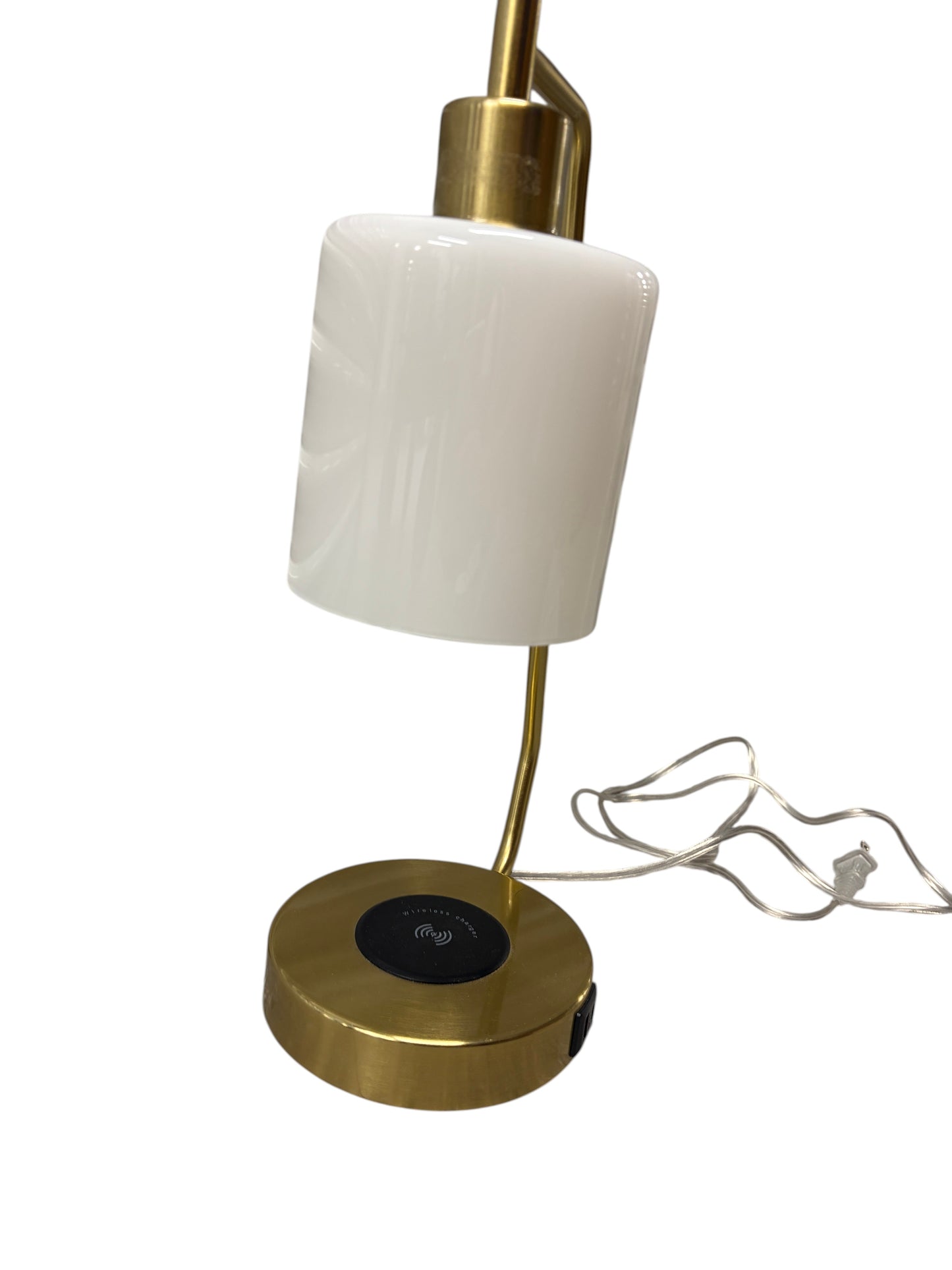 Gold desk or bedside table lamp with charging port in the base and opal glass shade.