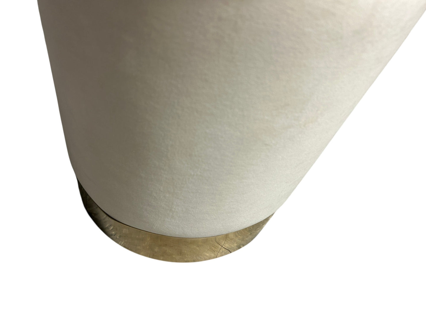 Off-white ottoman with gold base and storage.