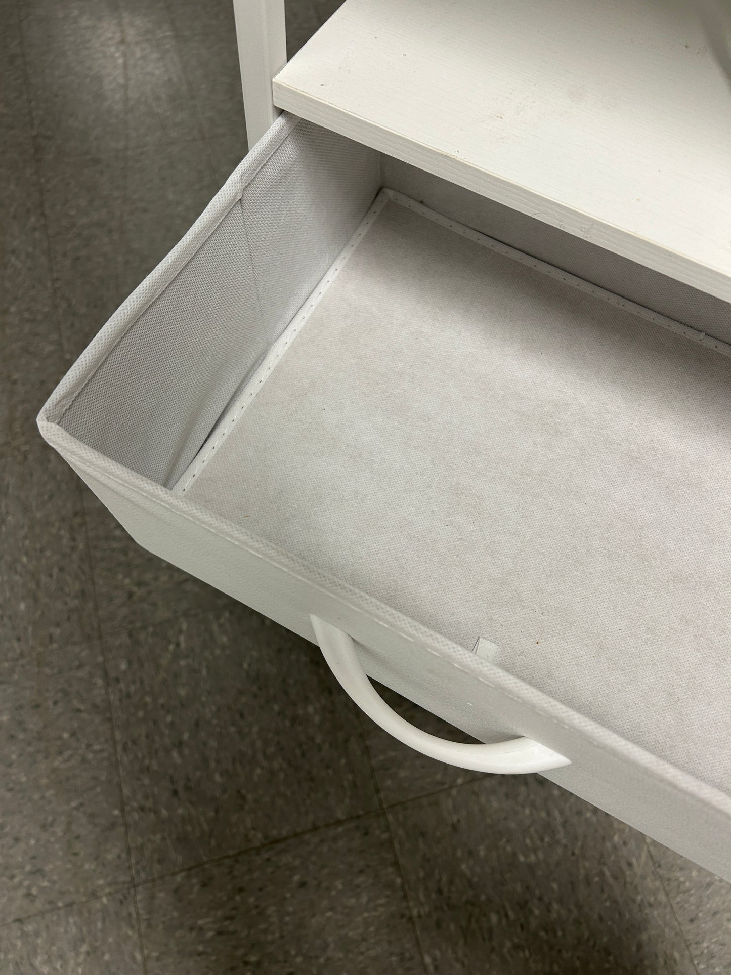 White nightstand with 5 drawers and power outlets.