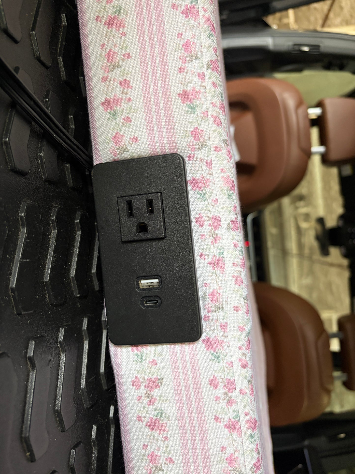 Pottery Barn Teen x LoveShackFancy pink floral twin headboard with charging port.