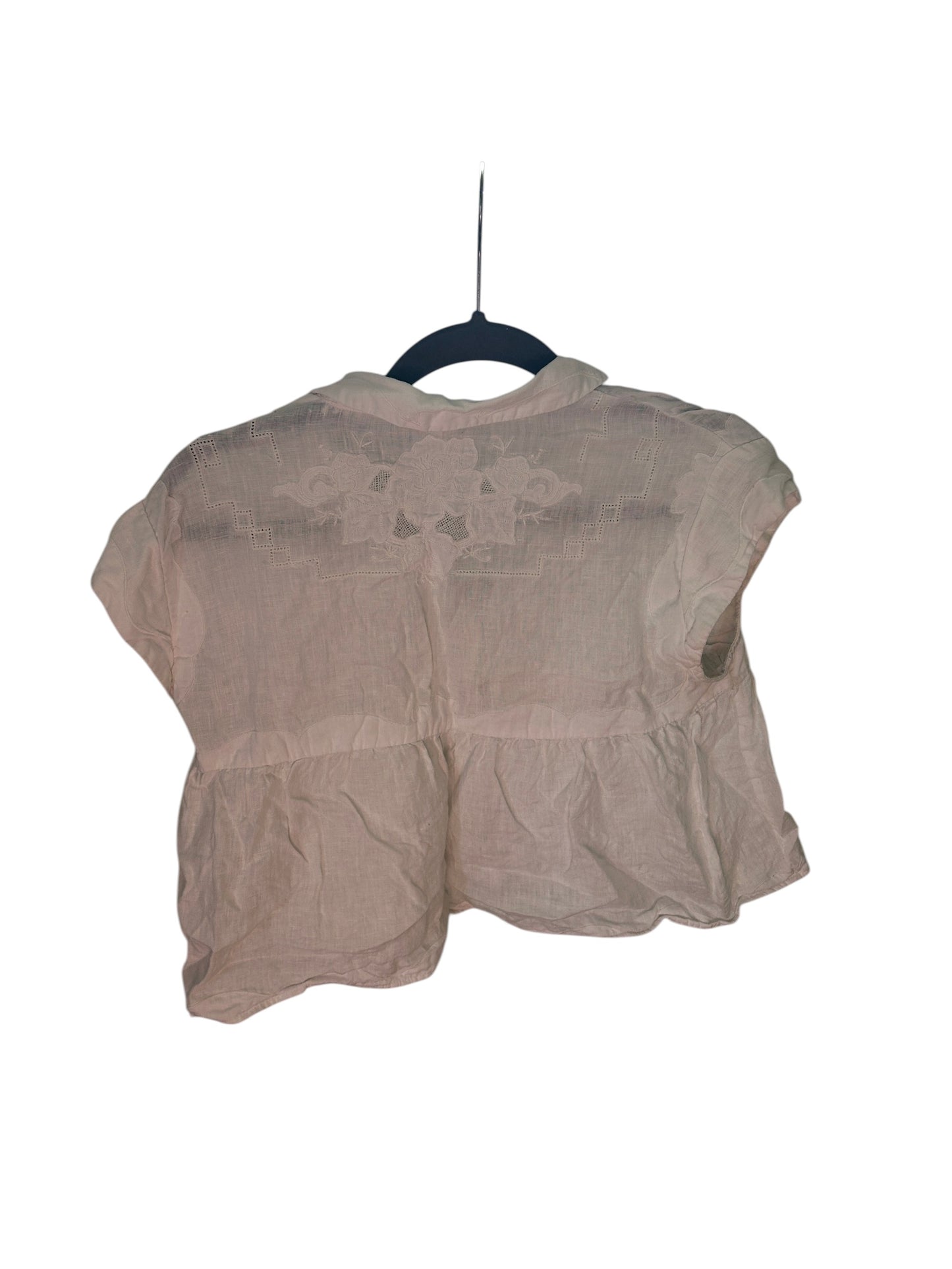 Anthropologie lightweight white short-sleeve blouse with delicate floral embroidery and lace detailing.