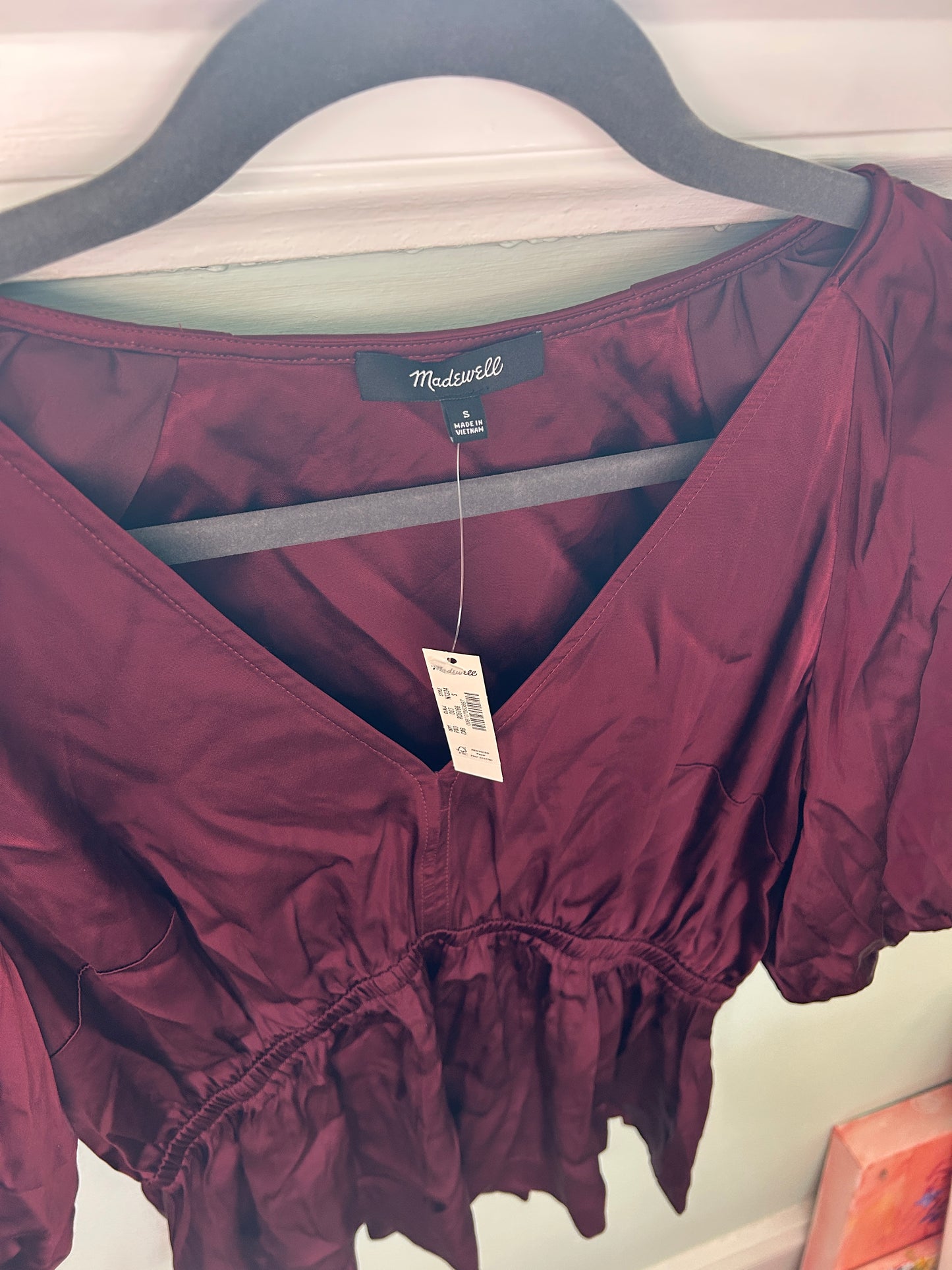 Madewell burgundy satin peplum blouse with puff sleeves and V-neckline, new with tags.