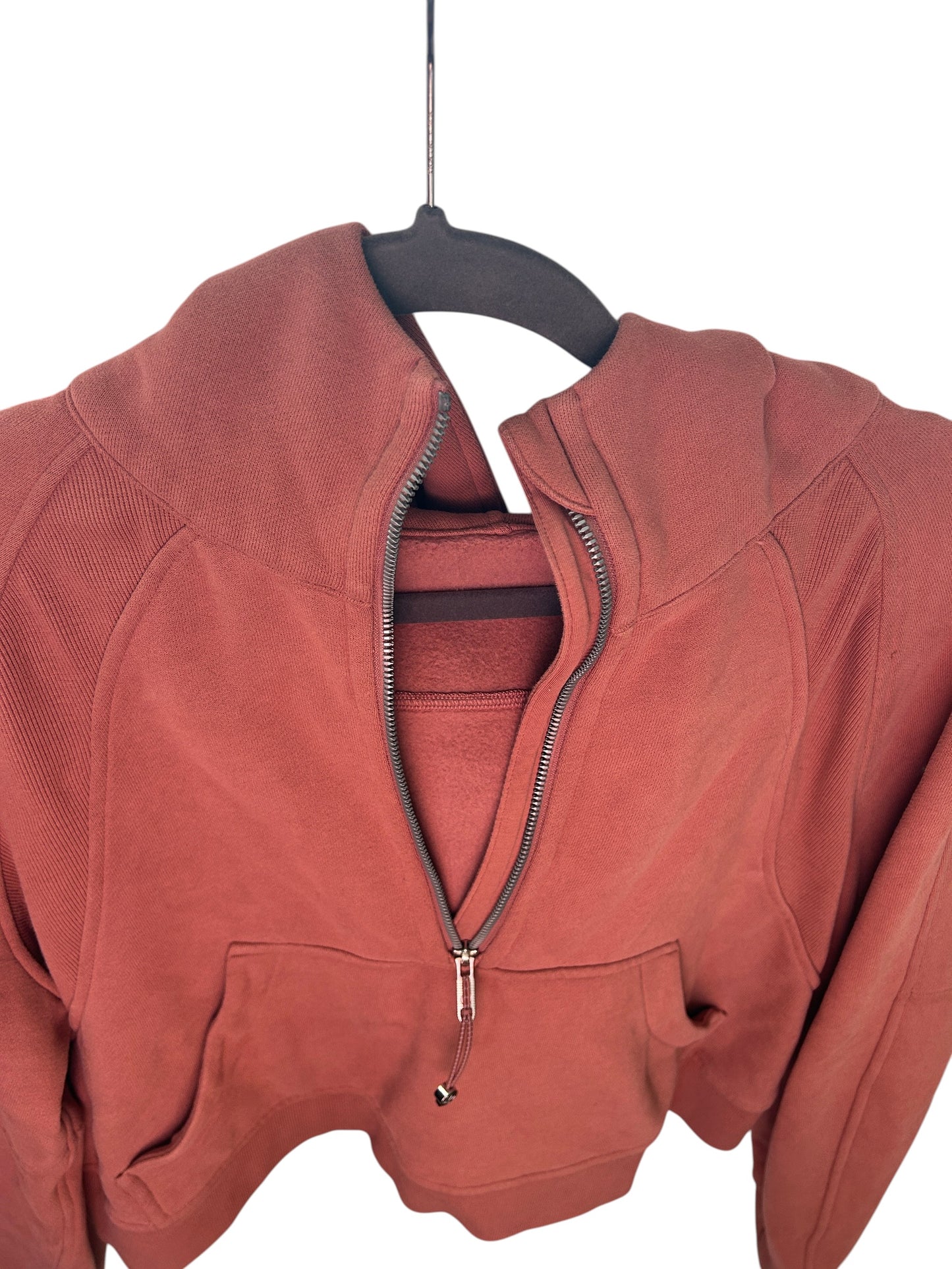 Lululemon M/L dusty rose cropped half-zip scuba hoodie with kangaroo pocket.