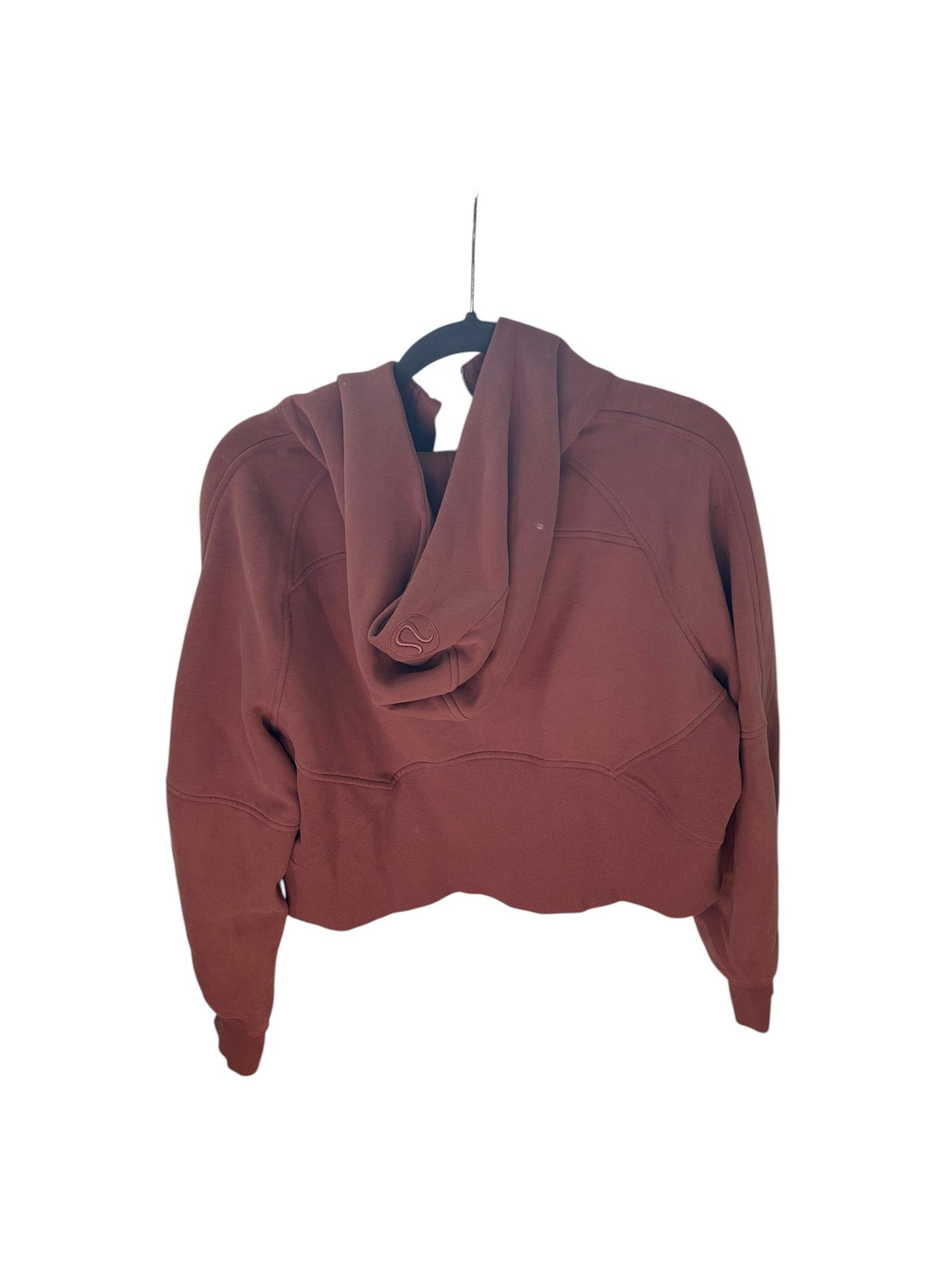 Lululemon M/L dusty rose cropped half-zip scuba hoodie with kangaroo pocket.