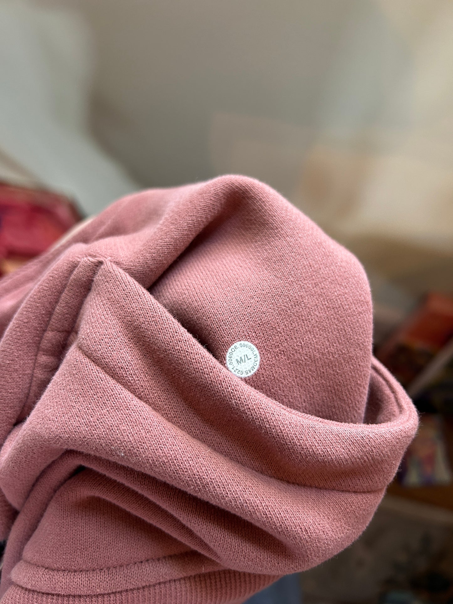 Lululemon M/L dusty rose cropped half-zip scuba hoodie with kangaroo pocket.