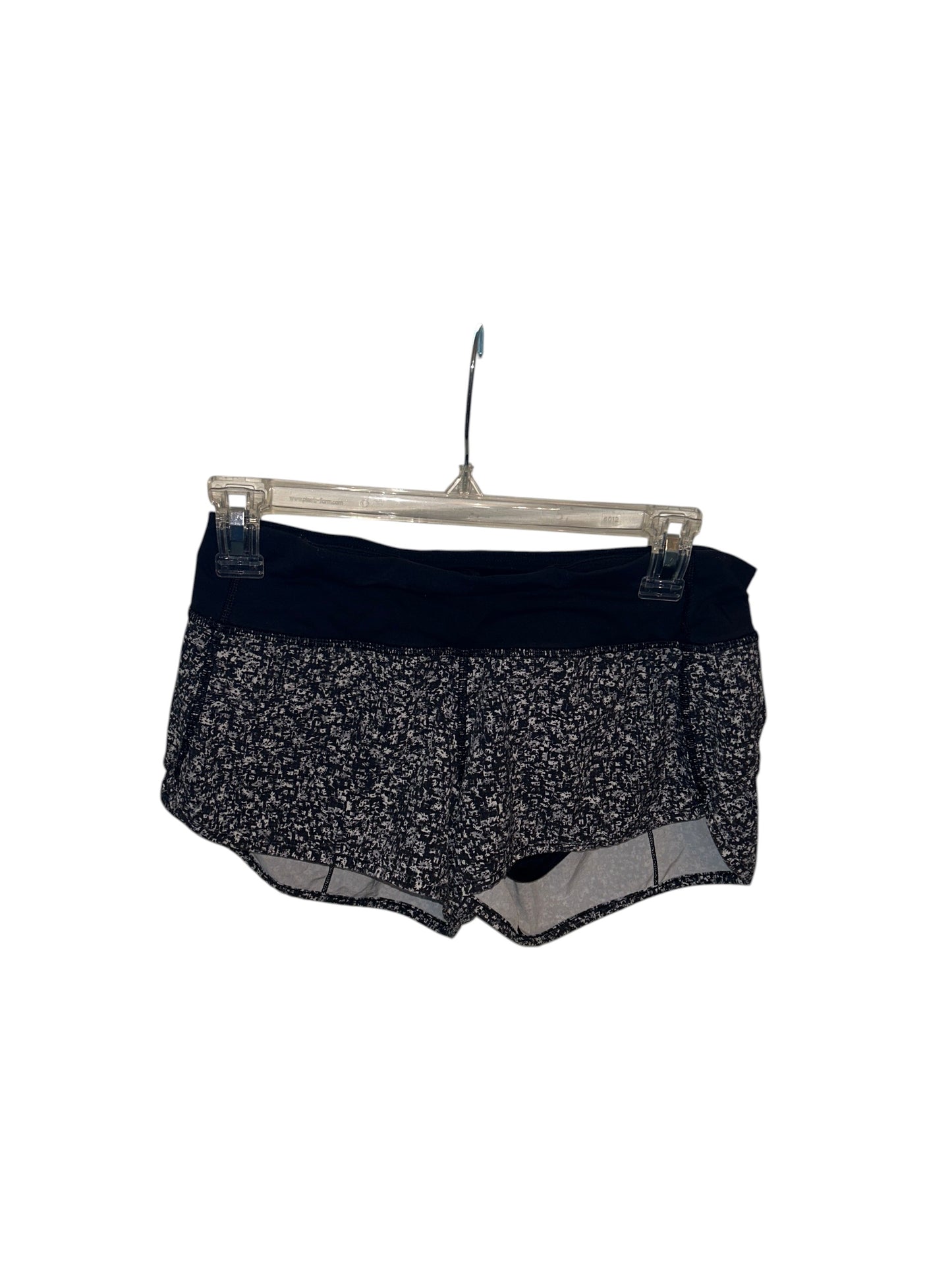 Lululemon Speed Up black and white speckled athletic running shorts with built-in liner and wide waistband.