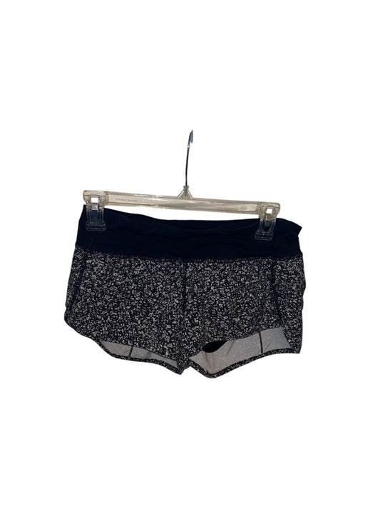 Lululemon Speed Up black and white speckled athletic running shorts with built-in liner and wide waistband.