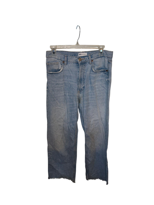 Zara light wash denim jeans with raw hem detailing and a relaxed straight leg fit.