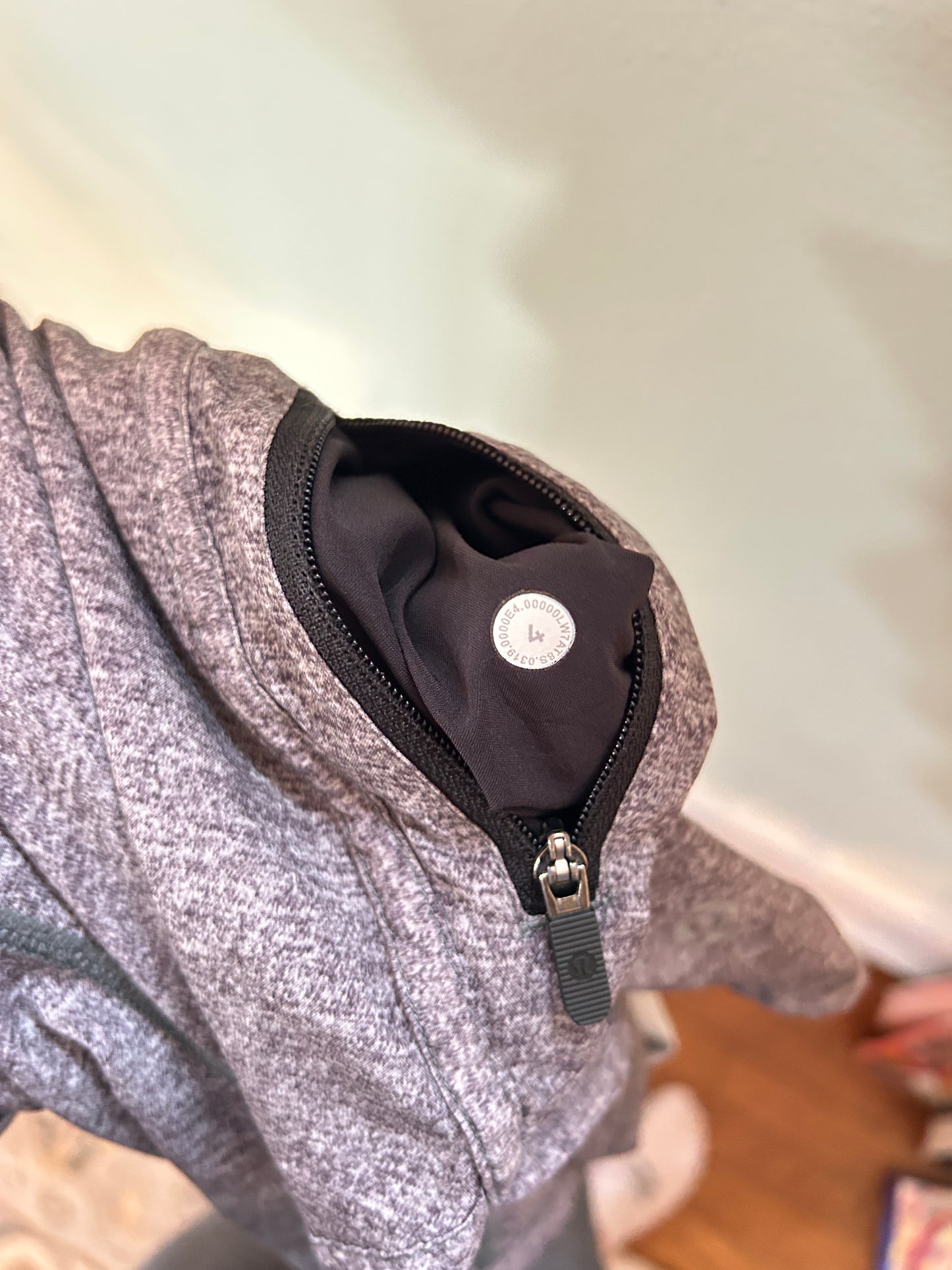 Lululemon heathered gray athletic running shorts with elastic waistband and drawstring.