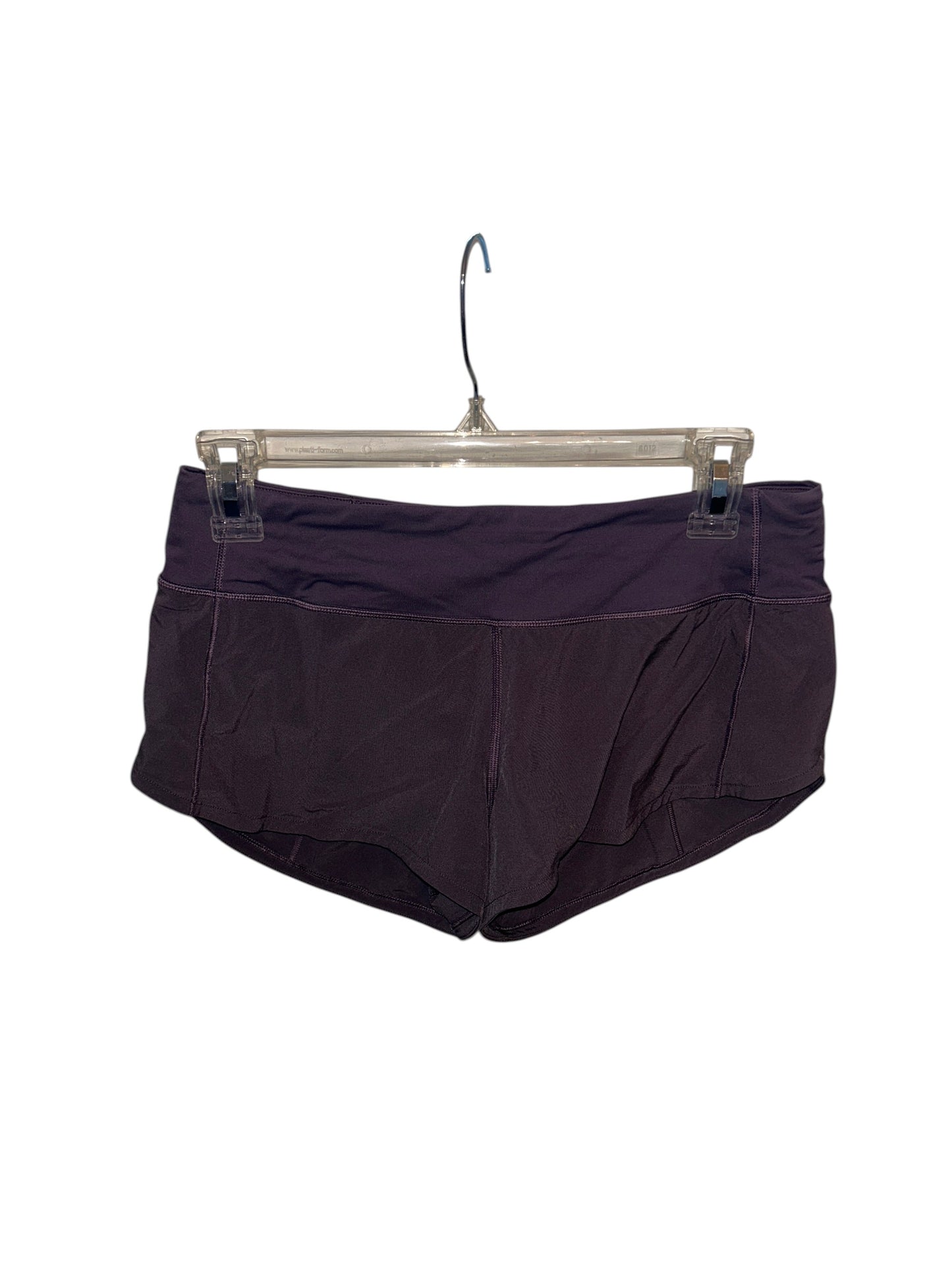 Lululemon purple athletic running shorts with a wide waistband and built-in liner.