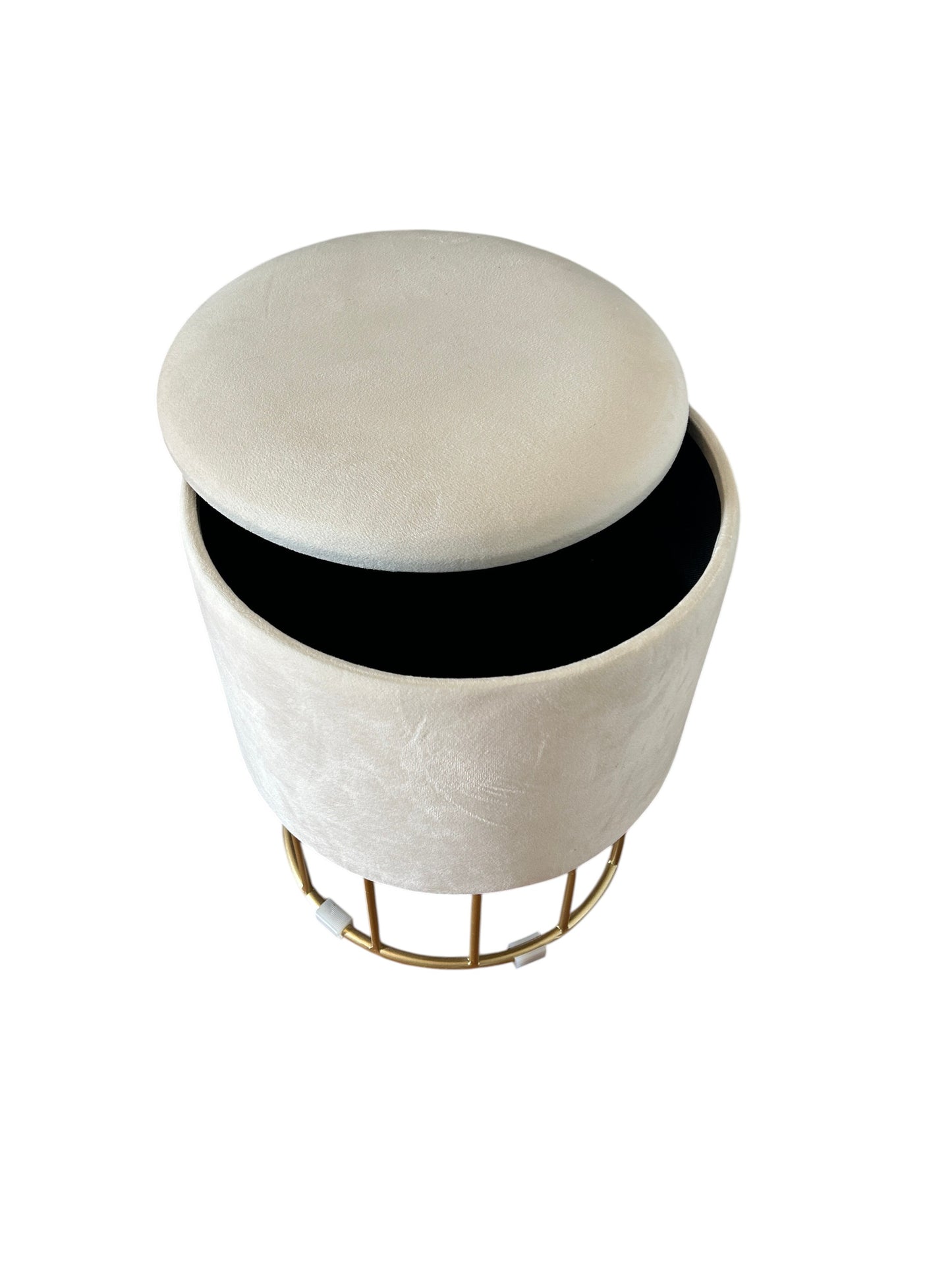 Round velvet storage ottoman with gold metal wire base.