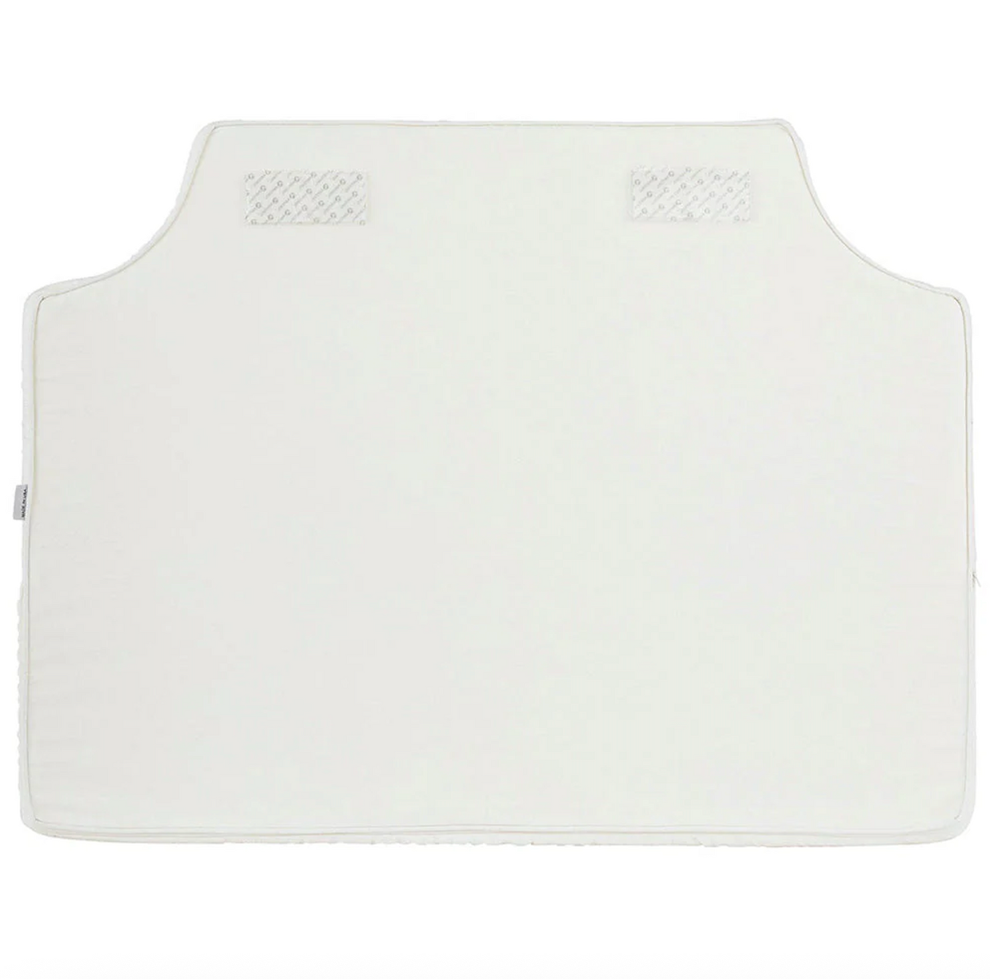 Room 422 twin white headboard with light pink piping trim along edges.