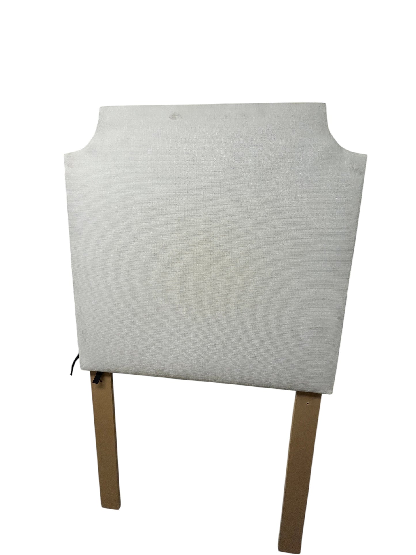 White Dorm Decor twin headboard with textured fabric and wooden legs.