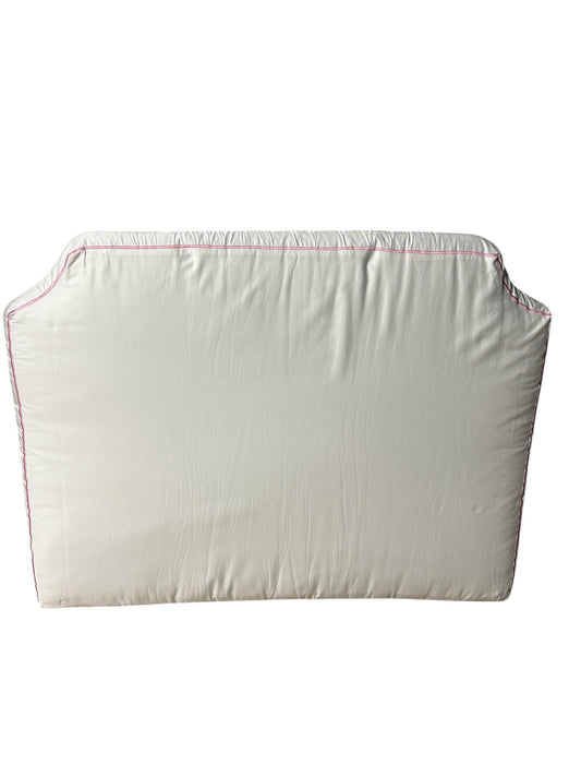 PushpLinen twin headboard with light pink piping trim along edges.