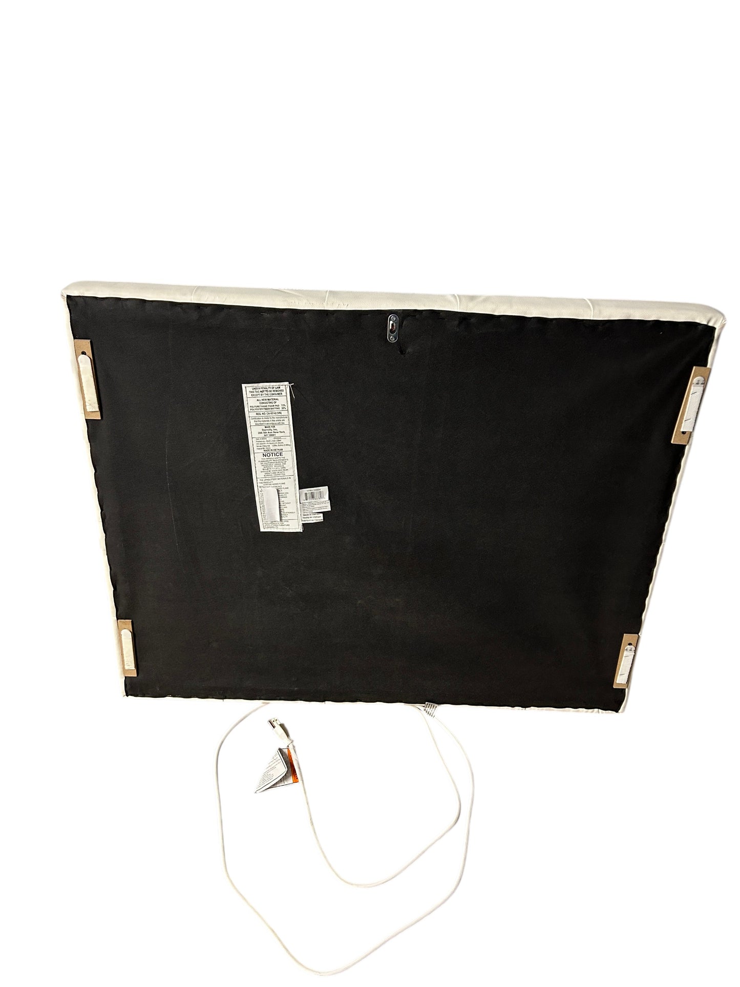 Dormify white twin headboard with faux leather and a charging outlet.