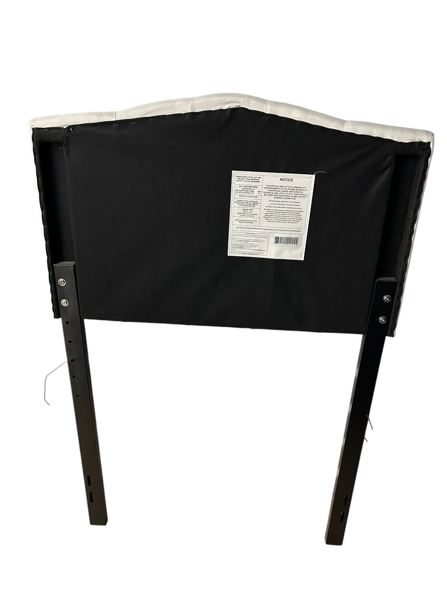 Gray twin headboard with black metal legs.