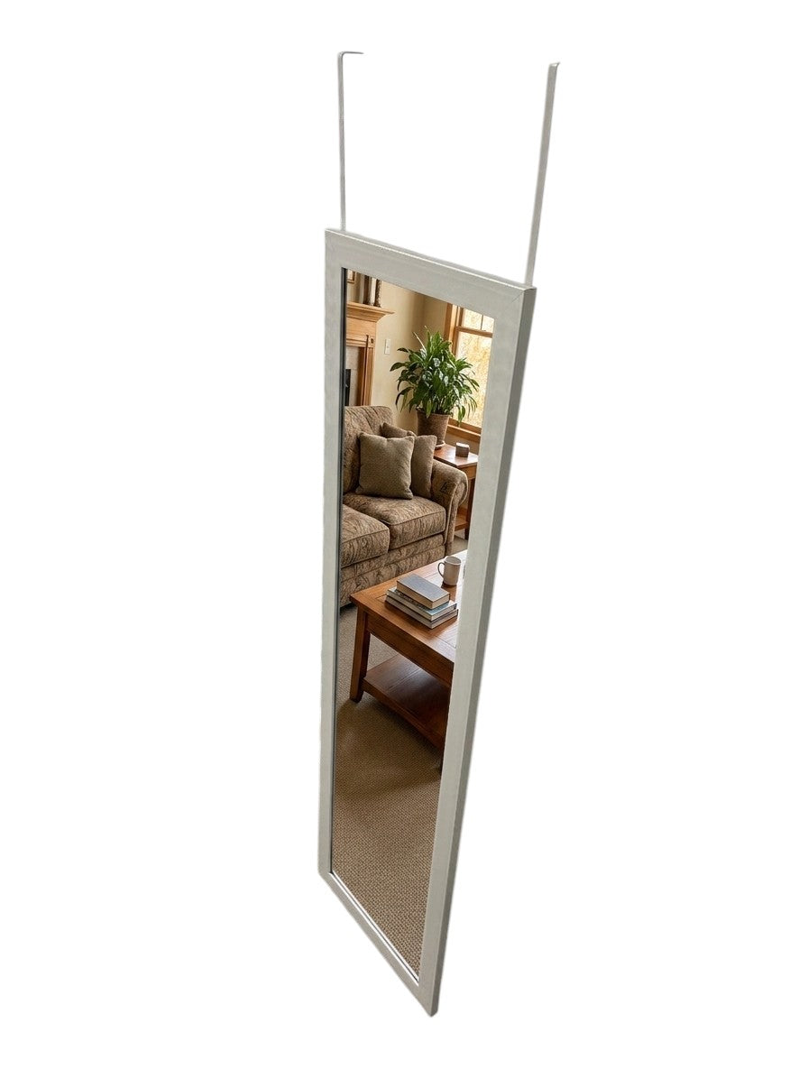 Full-length over-the-door mirror with white frame and metal hanging hooks.