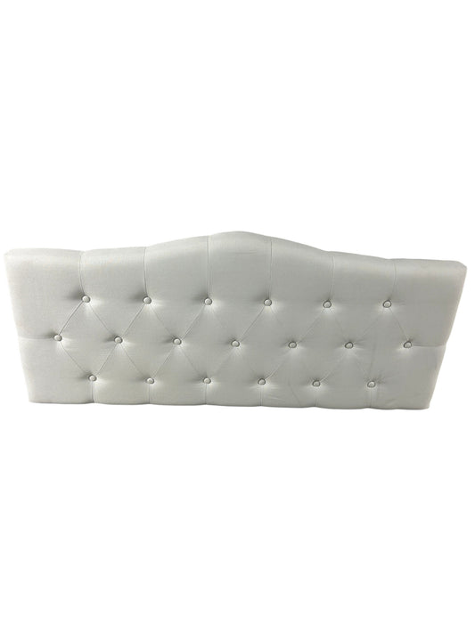 White queen upholstered tufted headboard with diamond button detailing.
