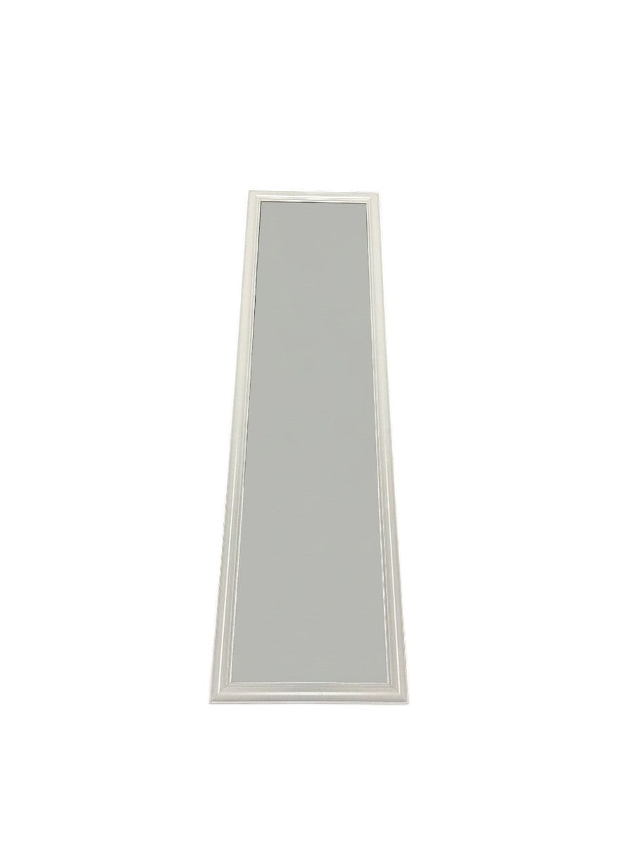 Full-length standing mirror with a white wooden frame.