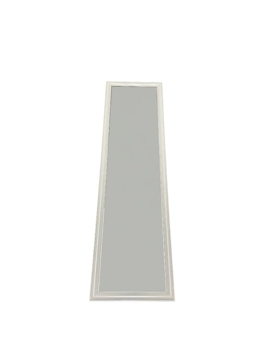 Full-length standing mirror with a white wooden frame.