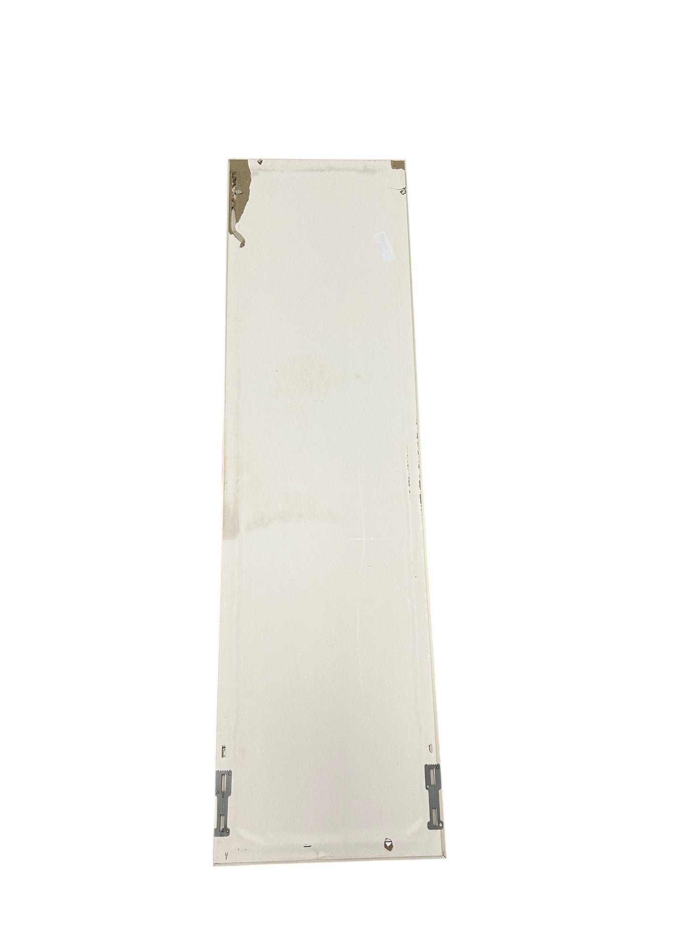 Full-length standing mirror with a white wooden frame.