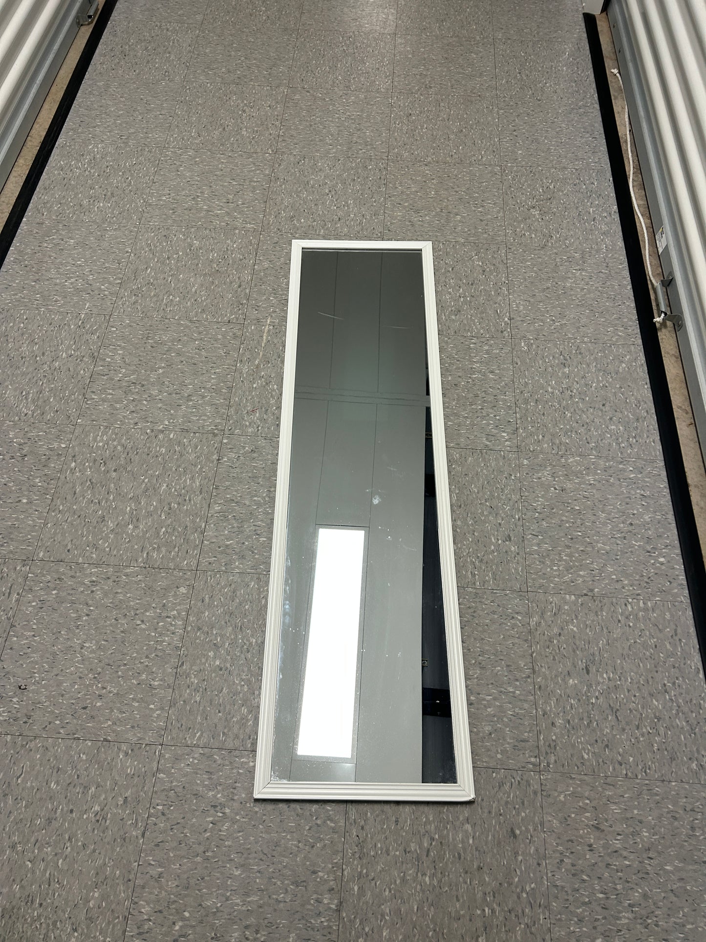 Target full-length standing floor mirror with a white frame.