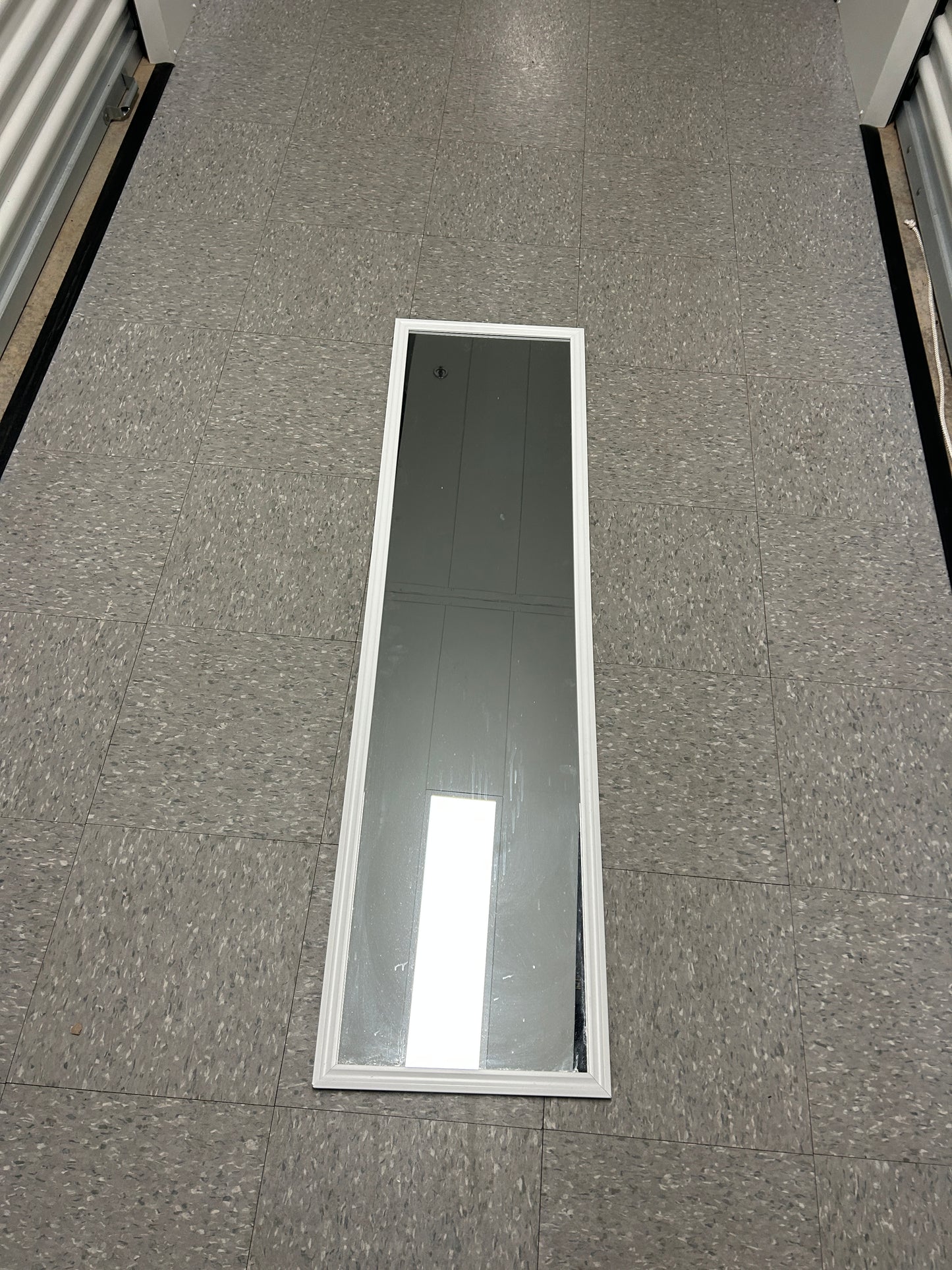 Target full-length standing floor mirror with a white frame.