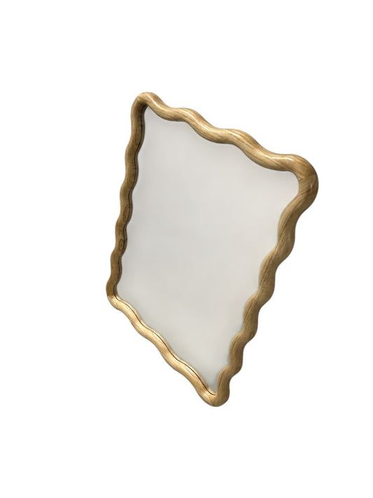 Target scalloped wall mirror with natural wood frame.