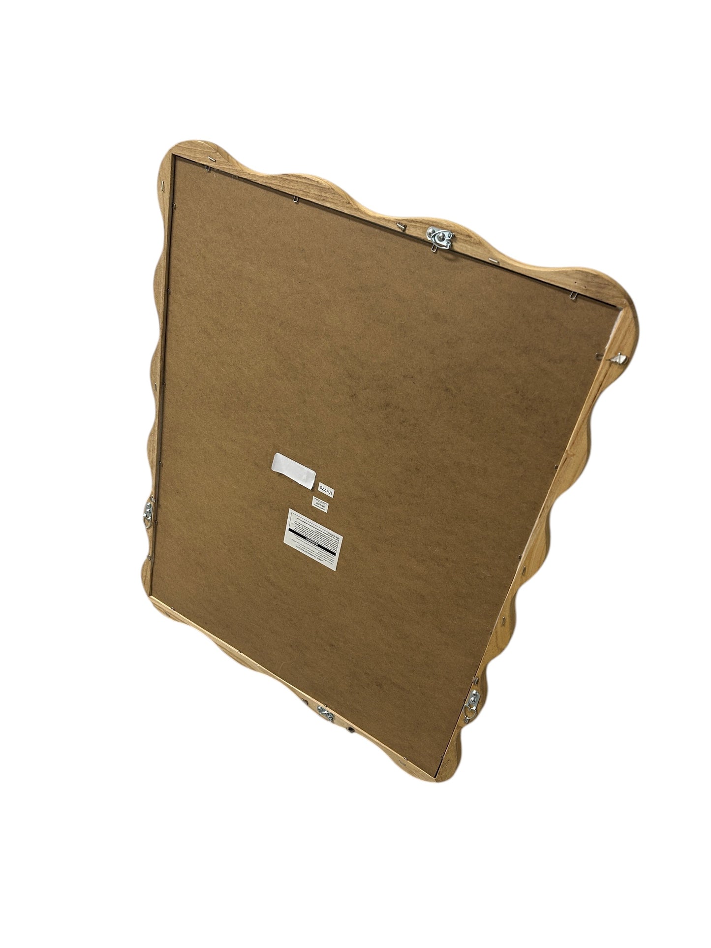 Target scalloped wall mirror with natural wood frame.