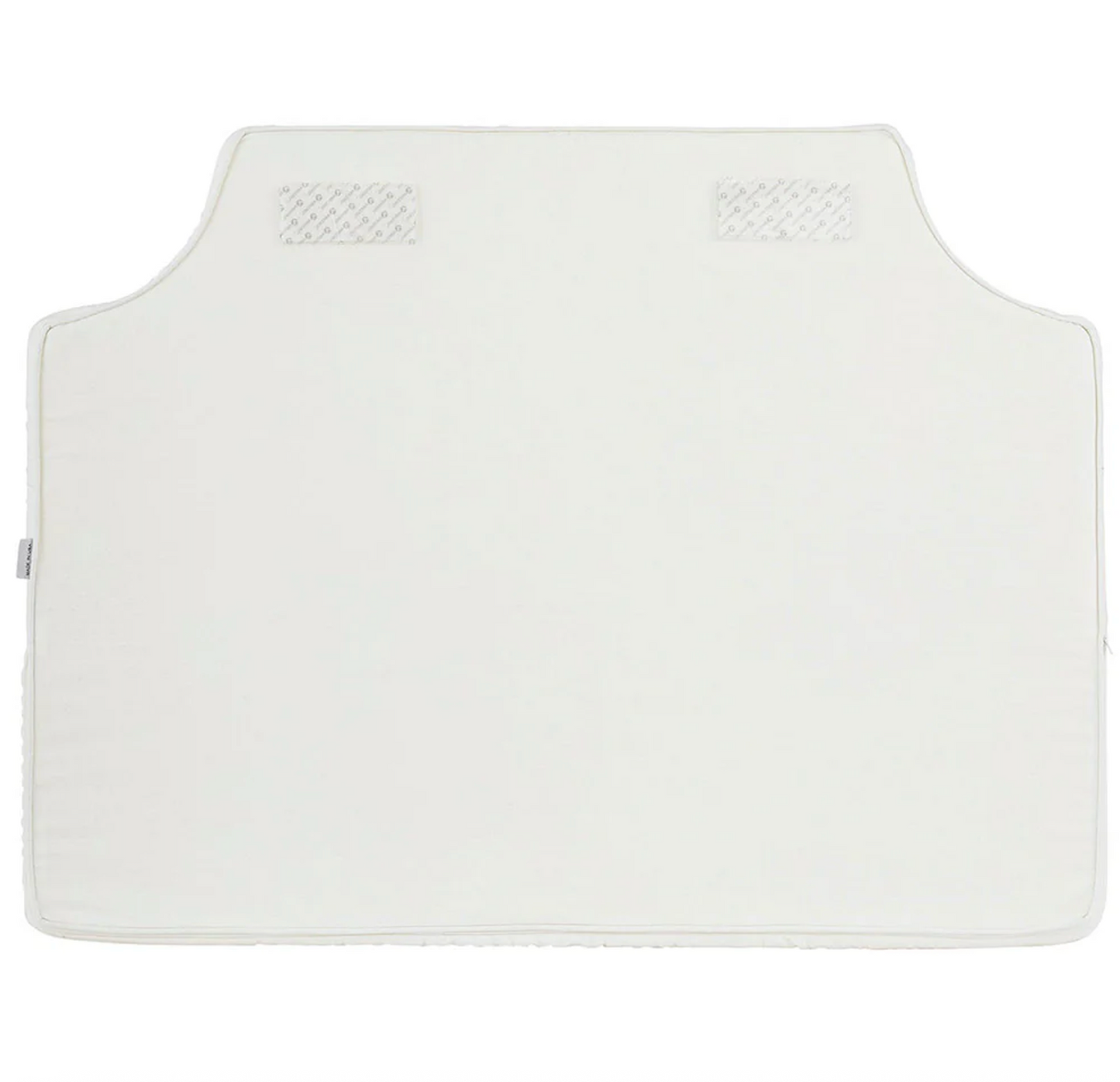 Room 422 twin white headboard with white piping trim along the edges.