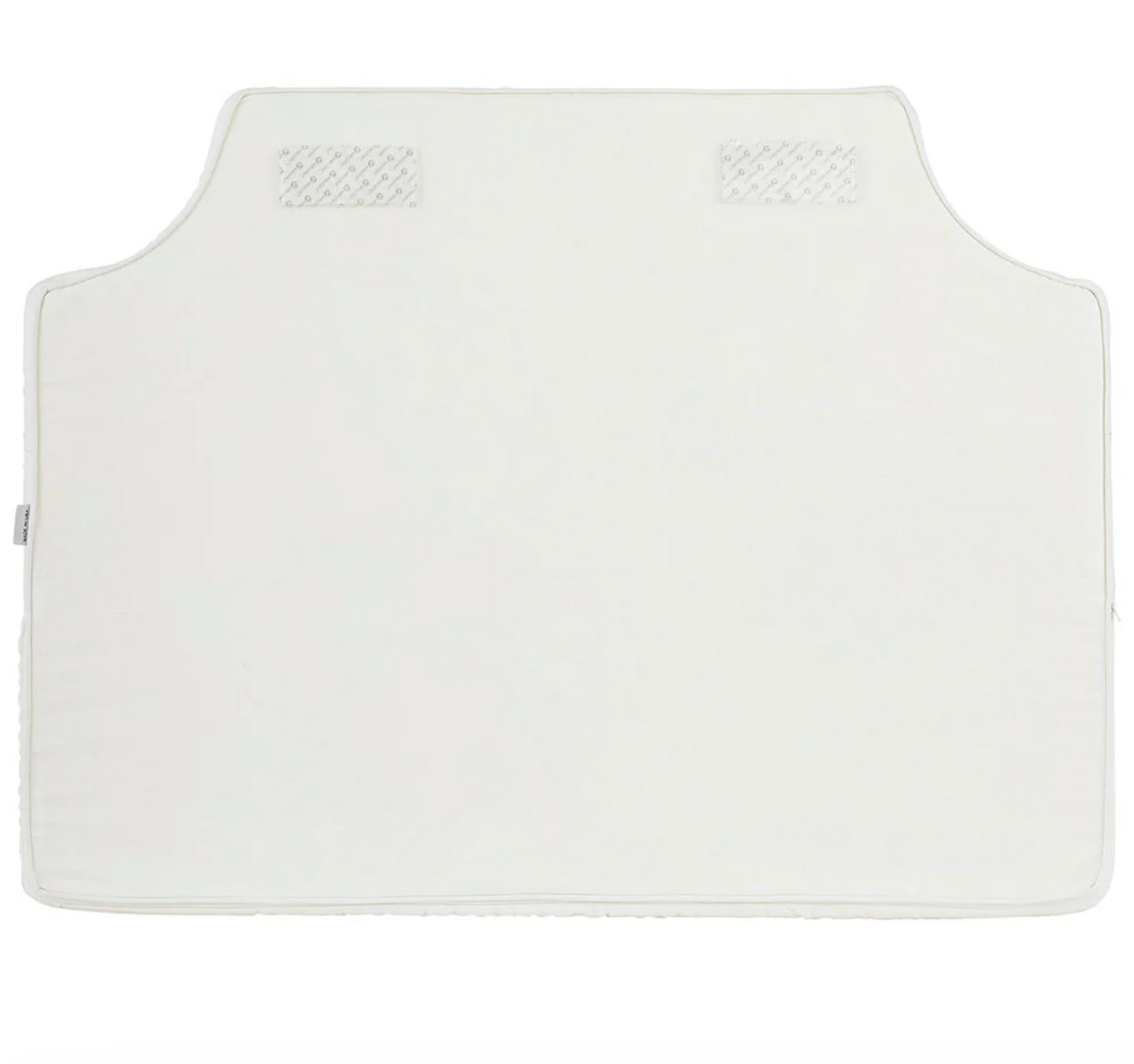 Room 422 twin white headboard with navy blue piping trim along the edges.
