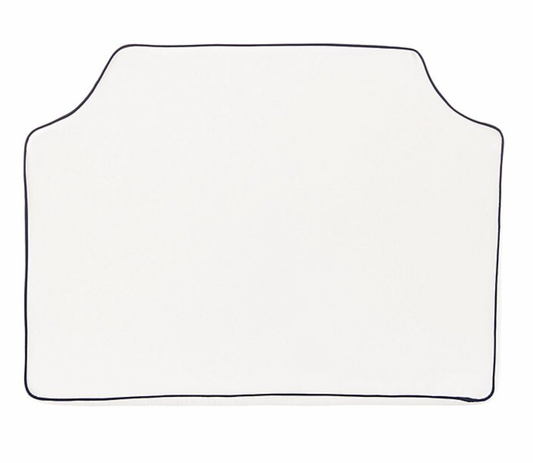 Ballard twin white headboard with navy blue piping trim along the edges.