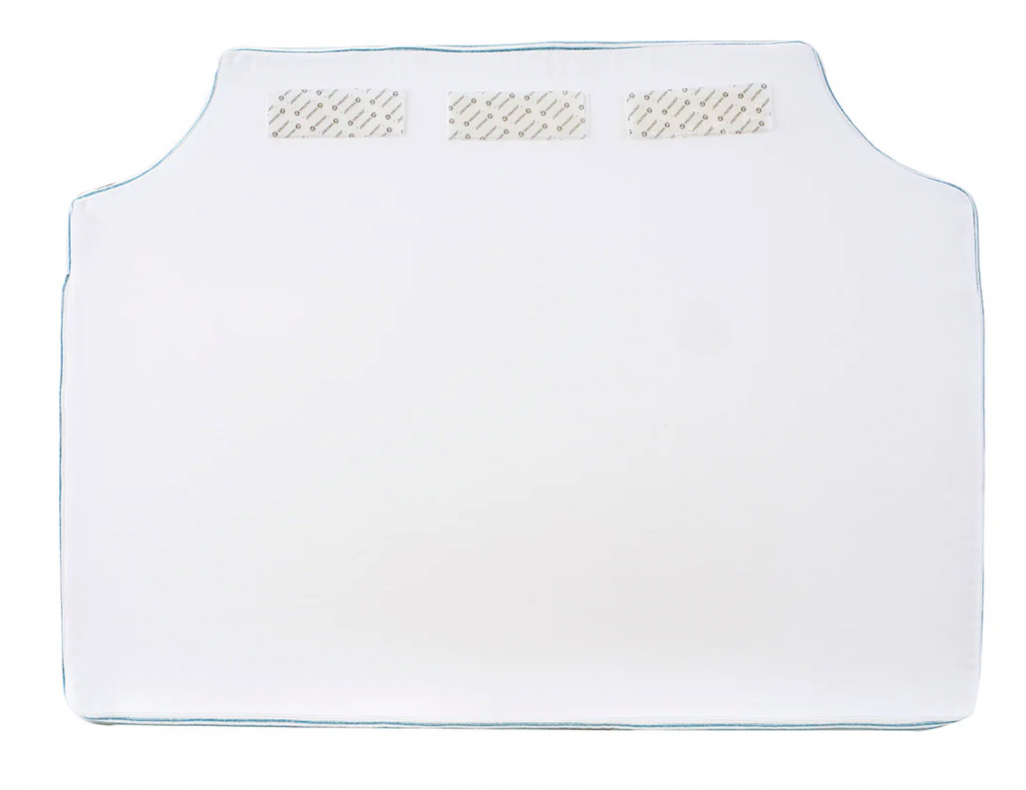 Room 422 twin blue and white striped headboard with blue piping trim along the edges.