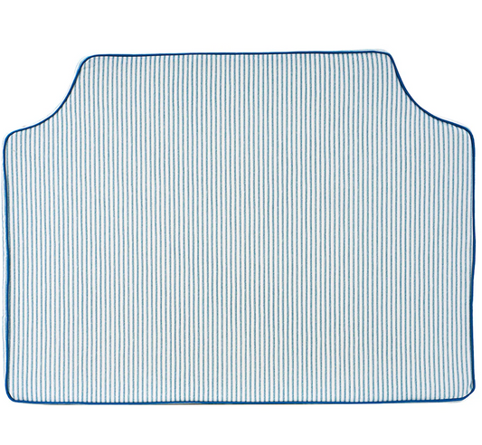 Room 422 twin blue and white striped headboard with blue piping trim along the edges.