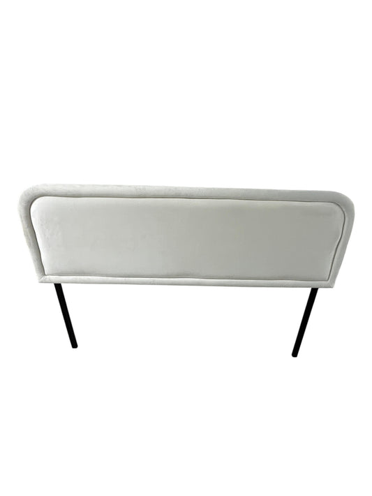 White queen velvet headboard with black metal legs.