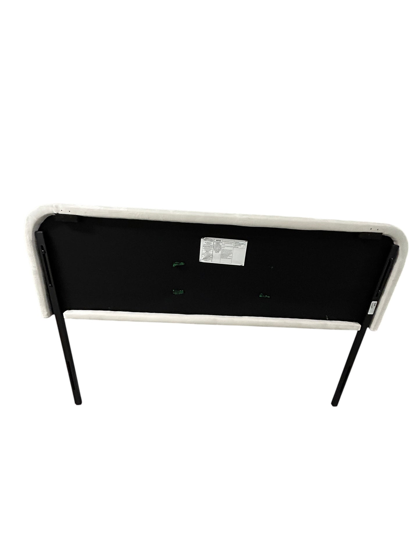 White queen velvet headboard with black metal legs.