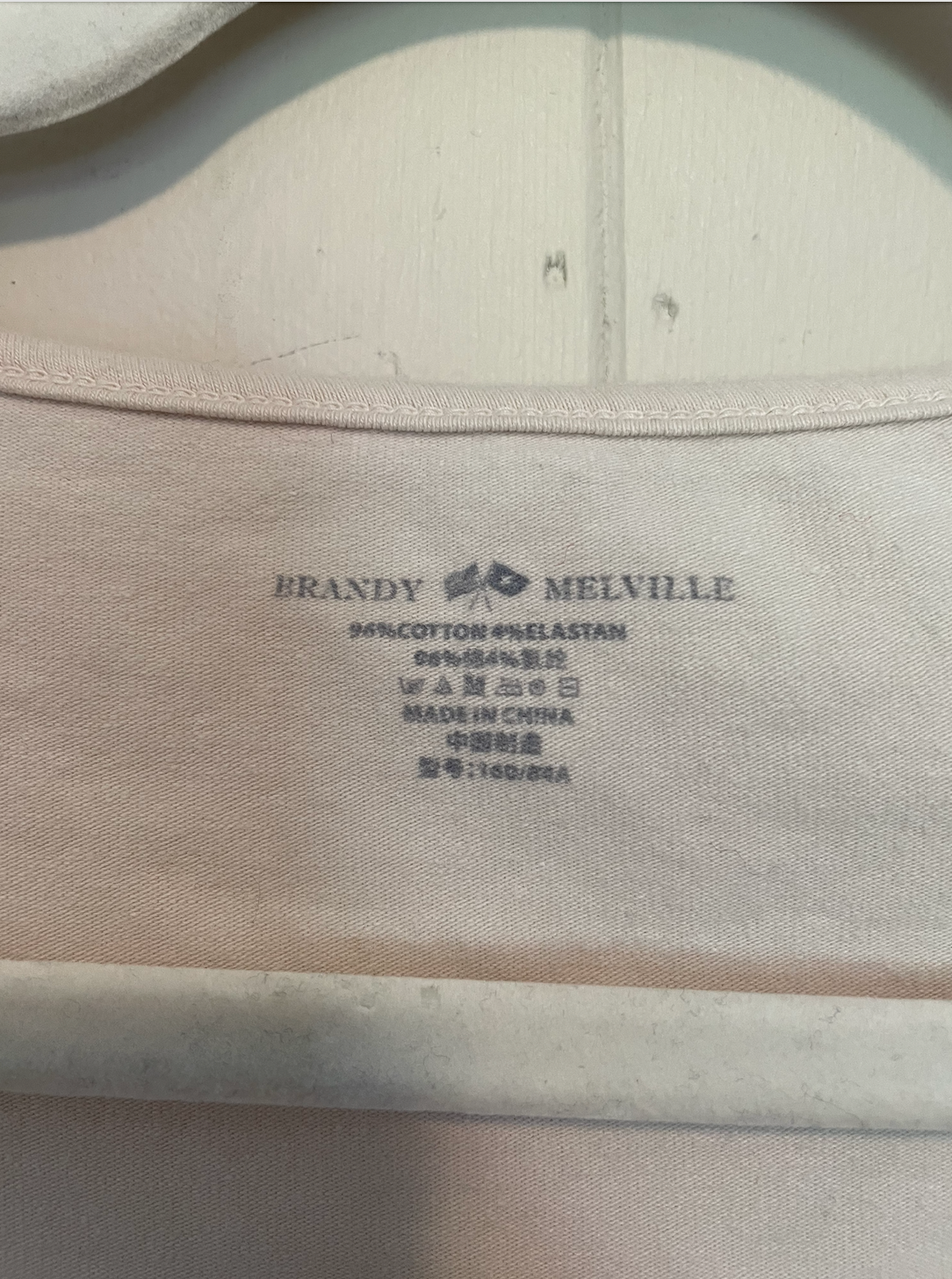 Brandy Melville cream top with square neckline.