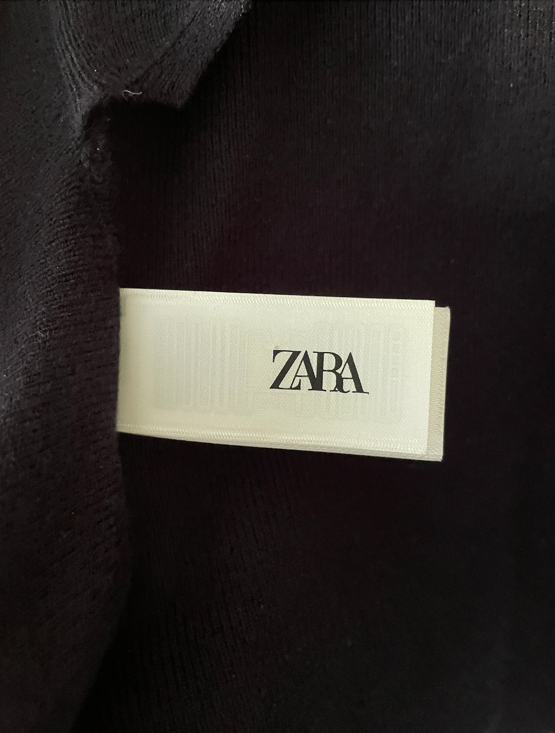 Zara black long-sleeve wrap-around tie sweater.