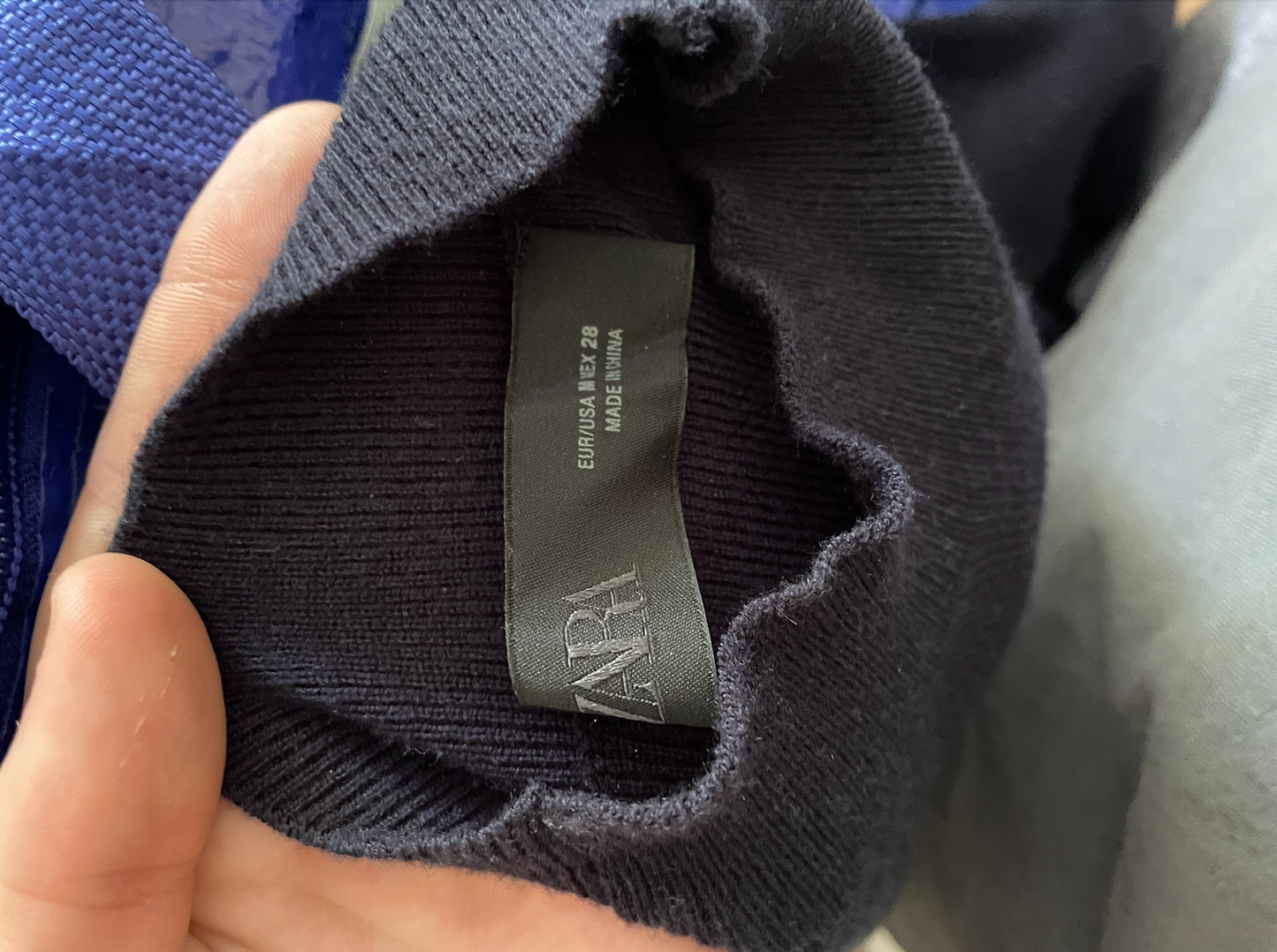 Zara black long-sleeve wrap-around tie sweater.