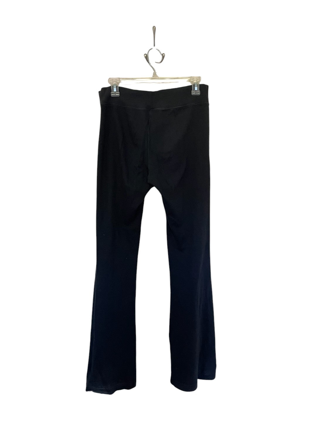 Black drawstring yoga/sweatpants with a wide waistband and flared leg opening.
