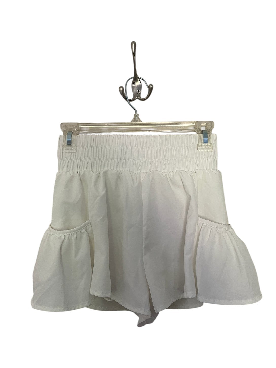 White athletic shorts with side pockets.