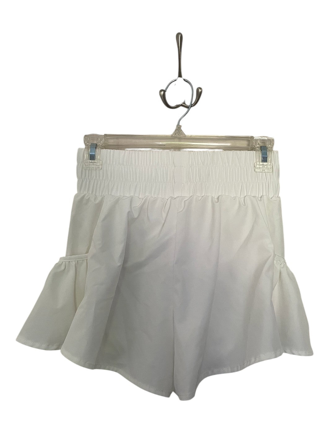 White athletic shorts with side pockets.